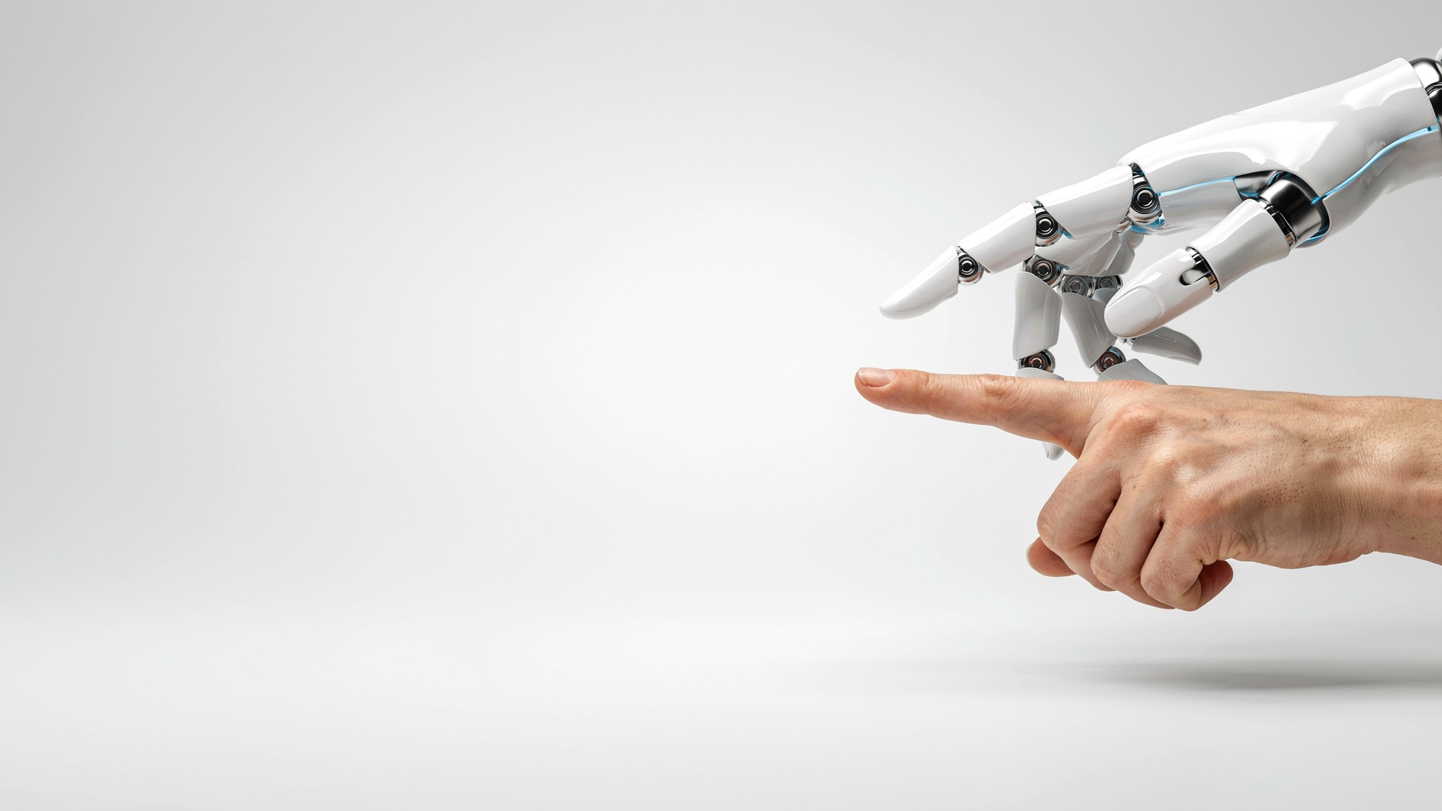 Ceramic-white robotic figure in a bright studio — about IN·DETAIL, a Johannesburg design agency established in 1991