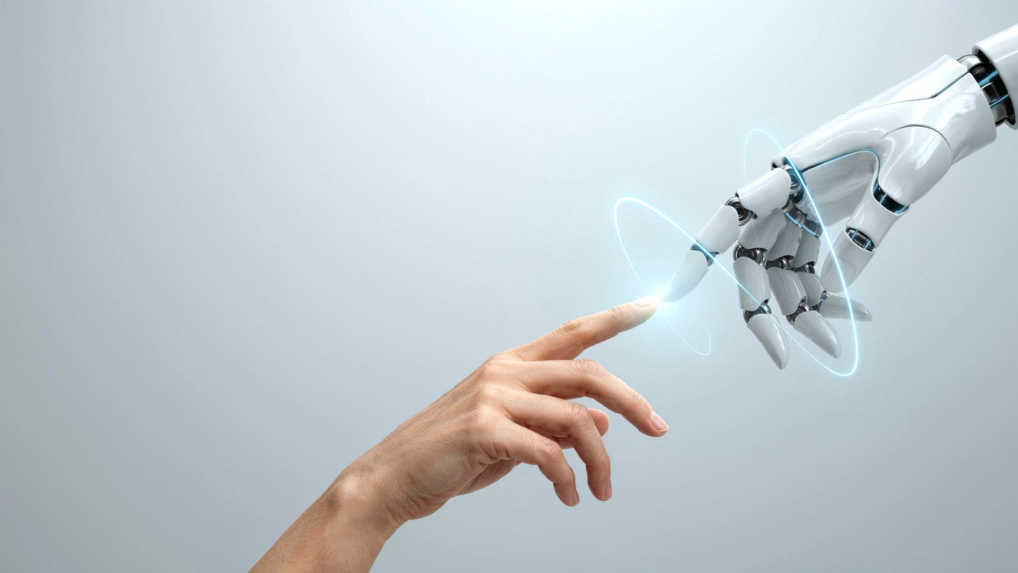 Robotic and human hands drawing a glowing curve together — AI-assisted design at scale