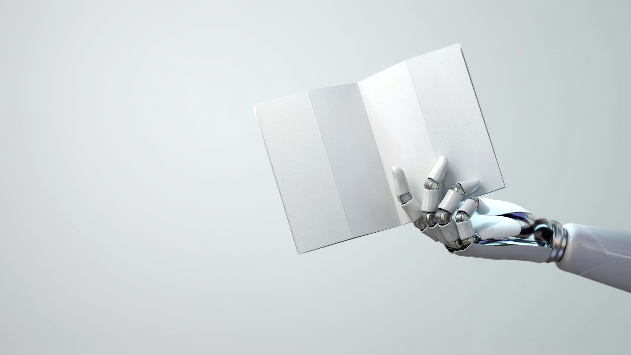 Robotic hand holding an open tri-fold brochure — brochure design services, Johannesburg