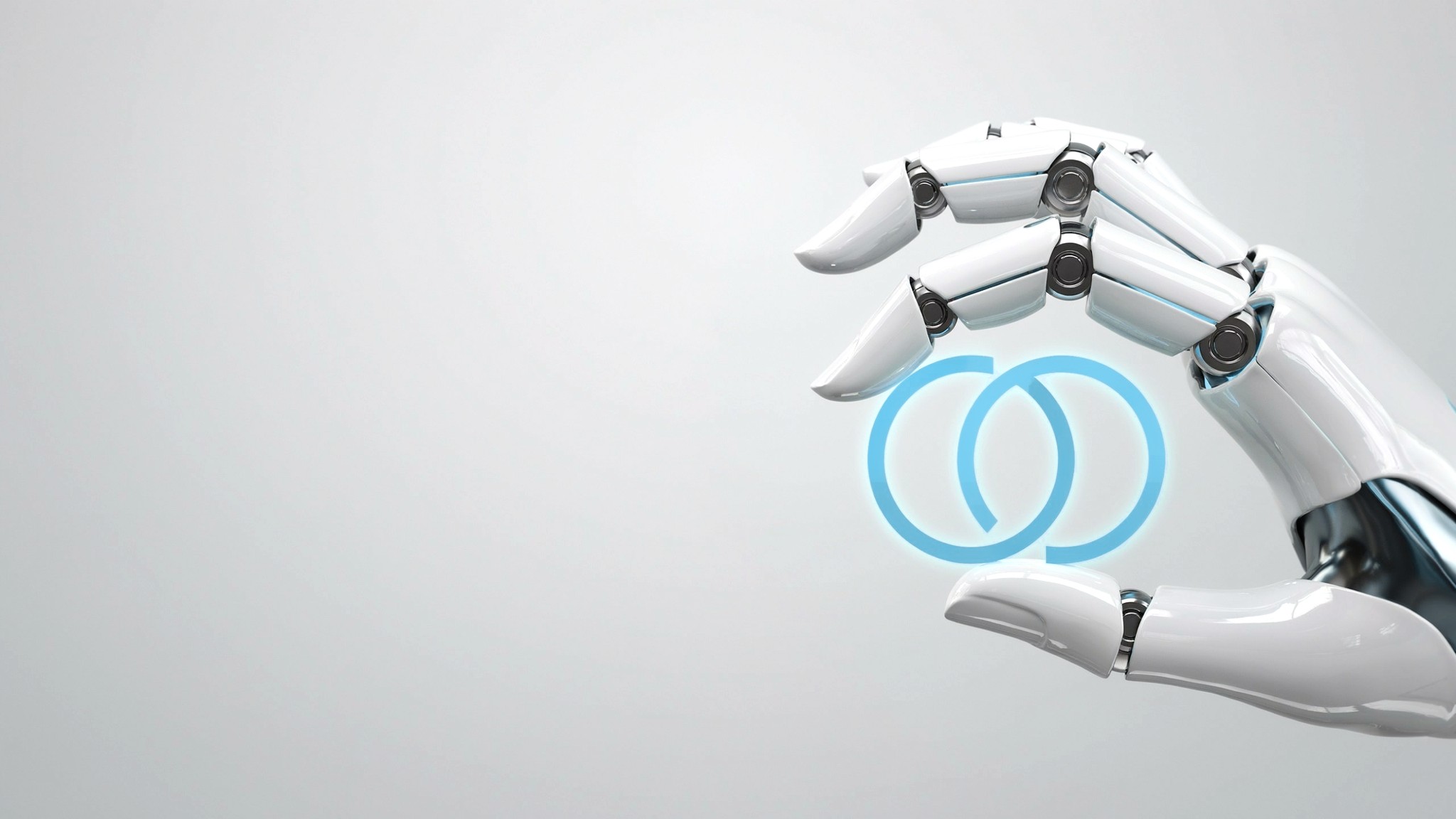 Robotic fingertips holding a glowing teal ring monogram — logo and brand identity design, Johannesburg