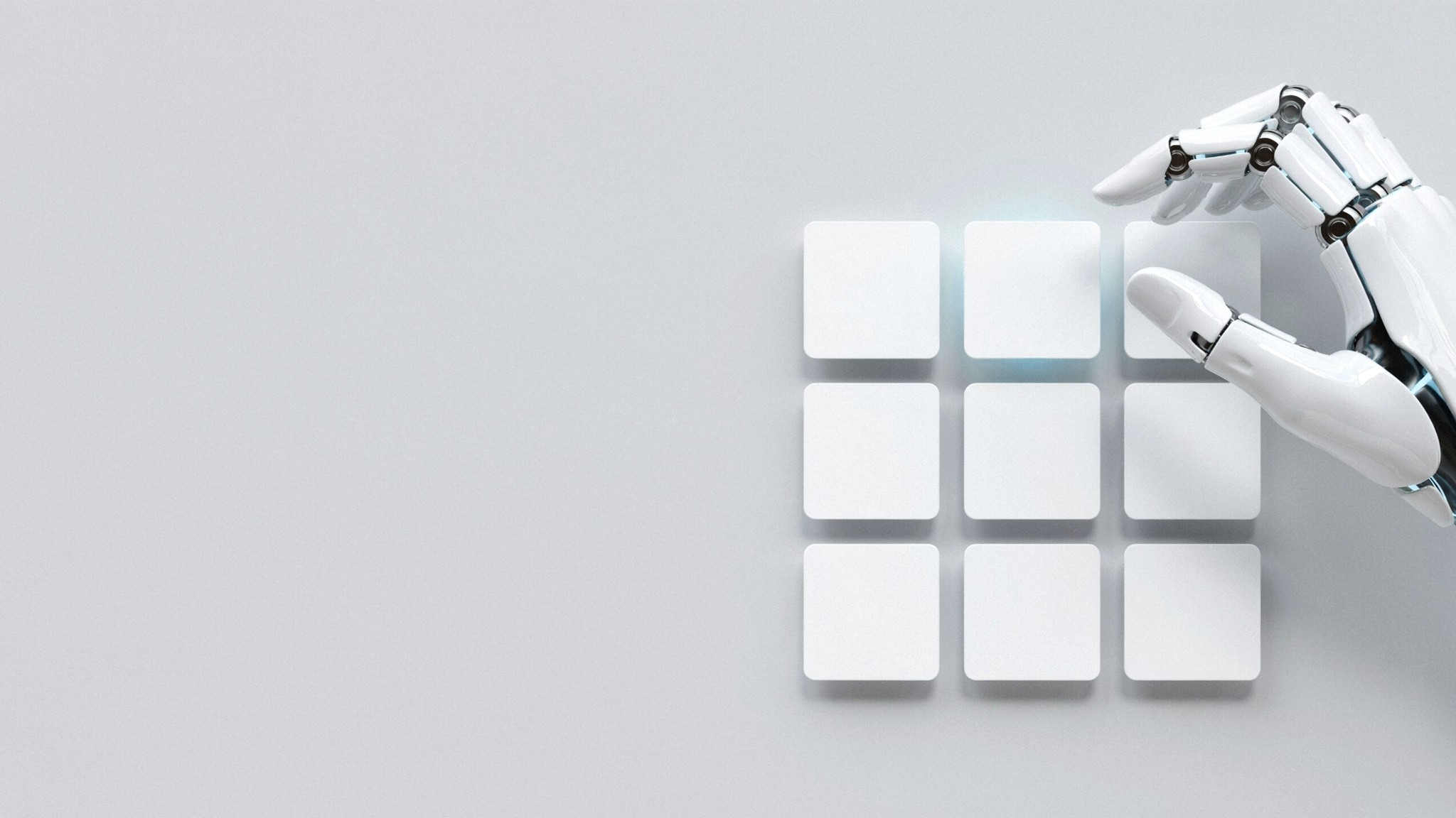 Robotic hand stacking square social post tiles — social media post design services